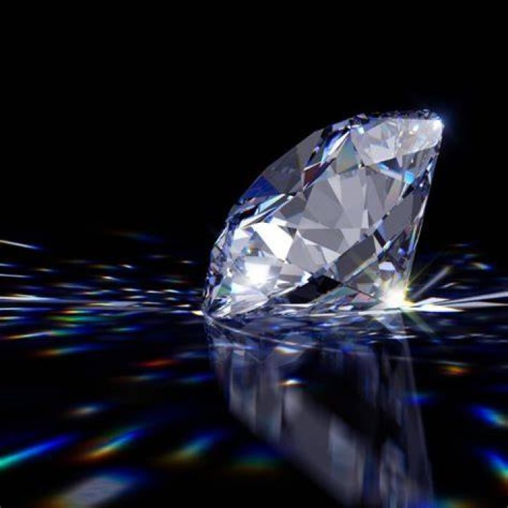 Do diamonds reflect or refract?