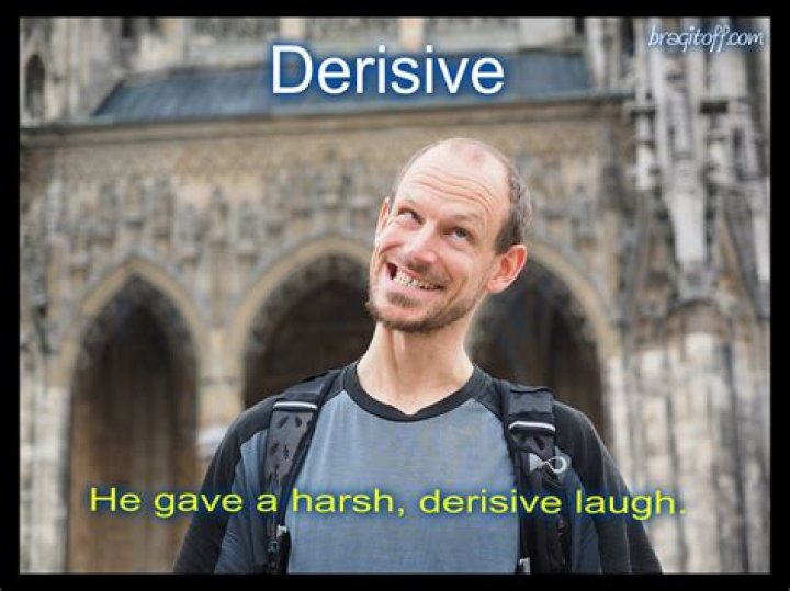 In a derisive manner?